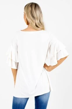 Build Your Dream Ruffle Top 37 Build Your Dream Ruffle Top -Outlet Bella Ella Boutique Store Build Your Dream Cream Top Back 5000x