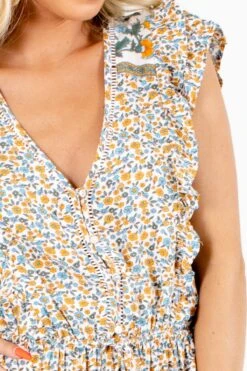 Create Your Sunshine White Floral Midi Dress 10 Create Your Sunshine White Floral Midi Dress -Outlet Bella Ella Boutique Store Create Your Sunshine White Dress Detail 5000x