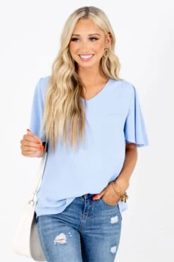 Taking Chances Flutter Sleeve Blouse -Outlet Bella Ella Boutique Store Taking Chances Blue Blouse Front 4afa3706 e94f 4eab 8897 1b64d8d702b8 5000x