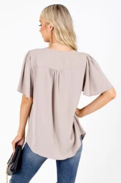Taking Chances Flutter Sleeve Blouse -Outlet Bella Ella Boutique Store Taking Chances Taupe Blouse Back 5000x