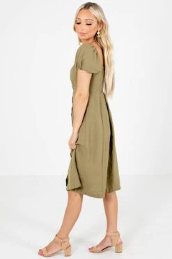 Two Worlds Apart Knee-Length Dress 13 Two Worlds Apart Knee-Length Dress -Outlet Bella Ella Boutique Store Two Worlds Apart Olive Dress Side 5000x