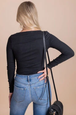 Wild Romance Long Sleeve Bodysuit -Outlet Bella Ella Boutique Store black back 6475abc2 f386 48fa a59a 08c1820bb80c 5000x