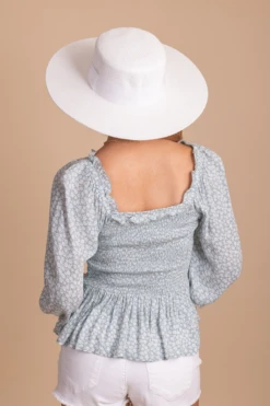 Desert Wildflower Smocked Long Sleeve Top 24 Desert Wildflower Smocked Long Sleeve Top -Outlet Bella Ella Boutique Store desertwildflowersmockedtoplightblueback 5000x