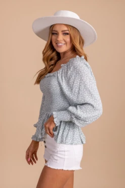 Desert Wildflower Smocked Long Sleeve Top 26 Desert Wildflower Smocked Long Sleeve Top -Outlet Bella Ella Boutique Store desertwildflowersmockedtoplightblueside 5000x