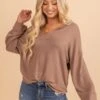 Good Energy V-Neck Top 2 Good Energy V-Neck Top -Outlet Bella Ella Boutique Store front c46251eb d375 4ca0 b0ee 6394a2cdeba3 5000x