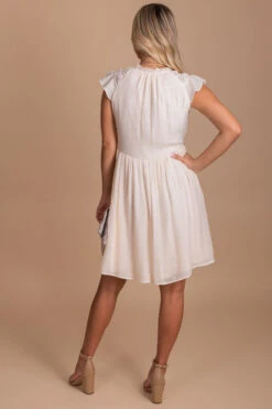 I'll Be Waiting Flutter Sleeve Mini Dress 17 I'll Be Waiting Flutter Sleeve Mini Dress -Outlet Bella Ella Boutique Store white back 8b0fed3b a314 4f73 9e3f 815e17fe7801 5000x