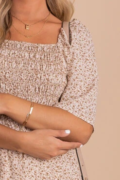 Oakley Floral Tiered Midi Dress 13 Oakley Floral Tiered Midi Dress -Outlet Bella Ella Boutique Store white detail 4797cd0f fedb 4f67 b065 5cc07b0feee8 5000x